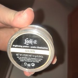 Kat Von D lock it brightening powder. Shade golden